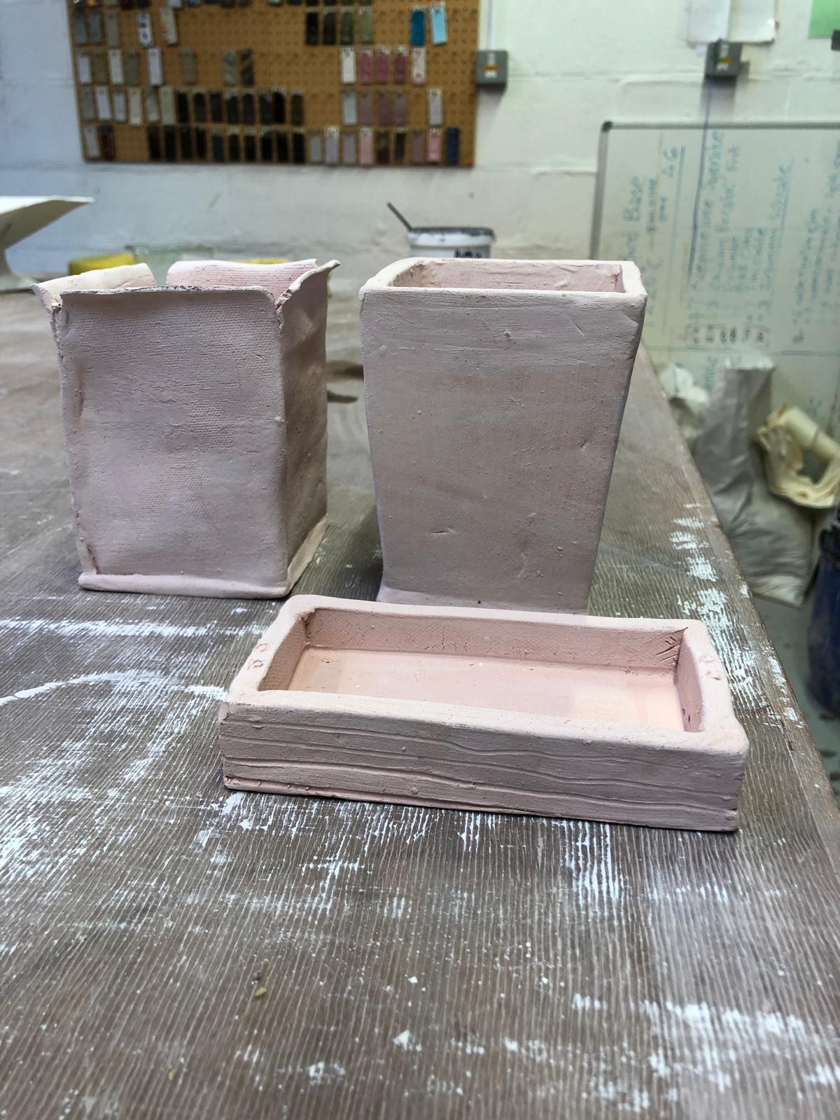 Greene King vessels in greenware state — drying before bisque firing